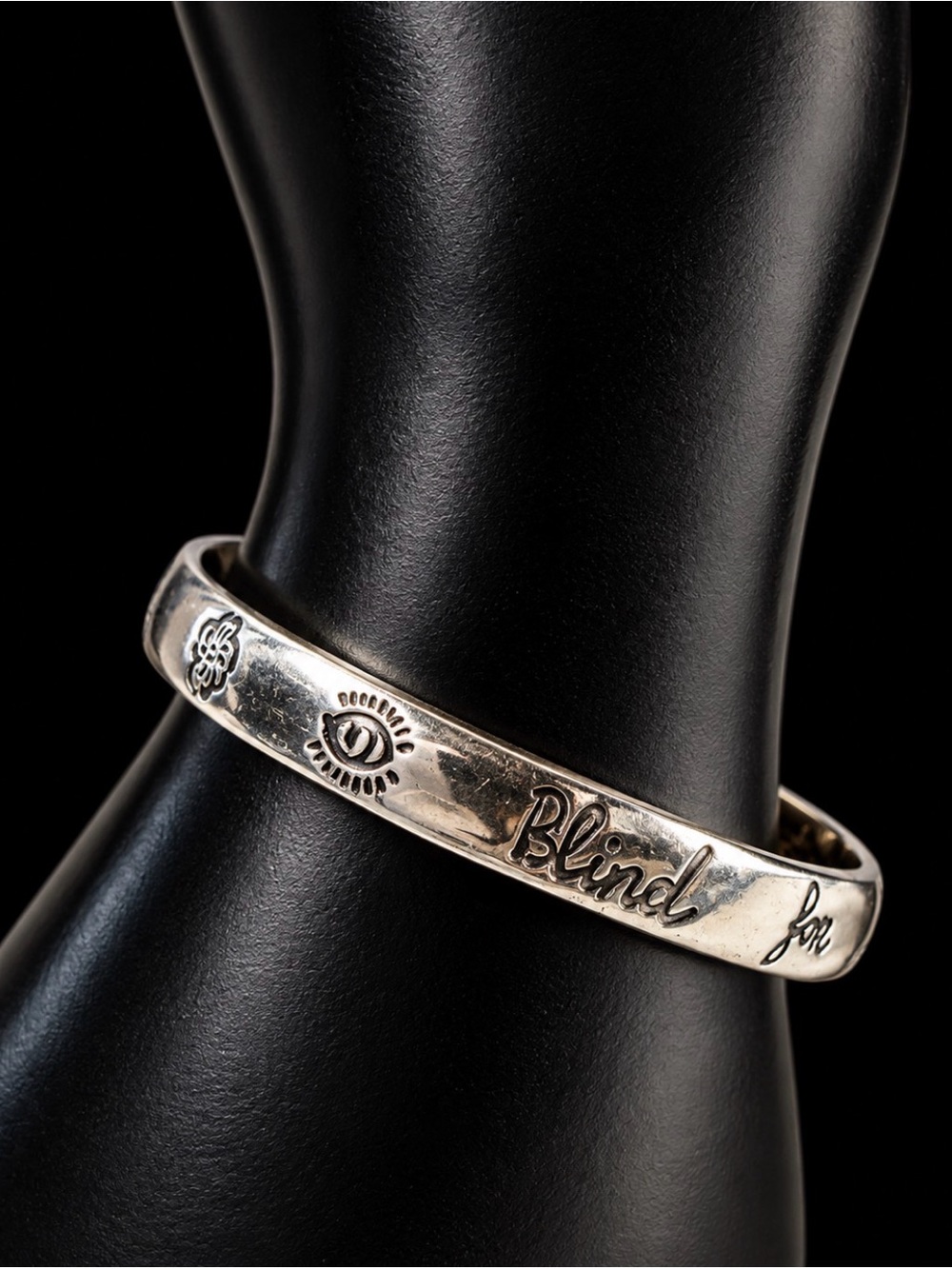 Blind for Love Silver-Tone Engraved Bangle Bracelet